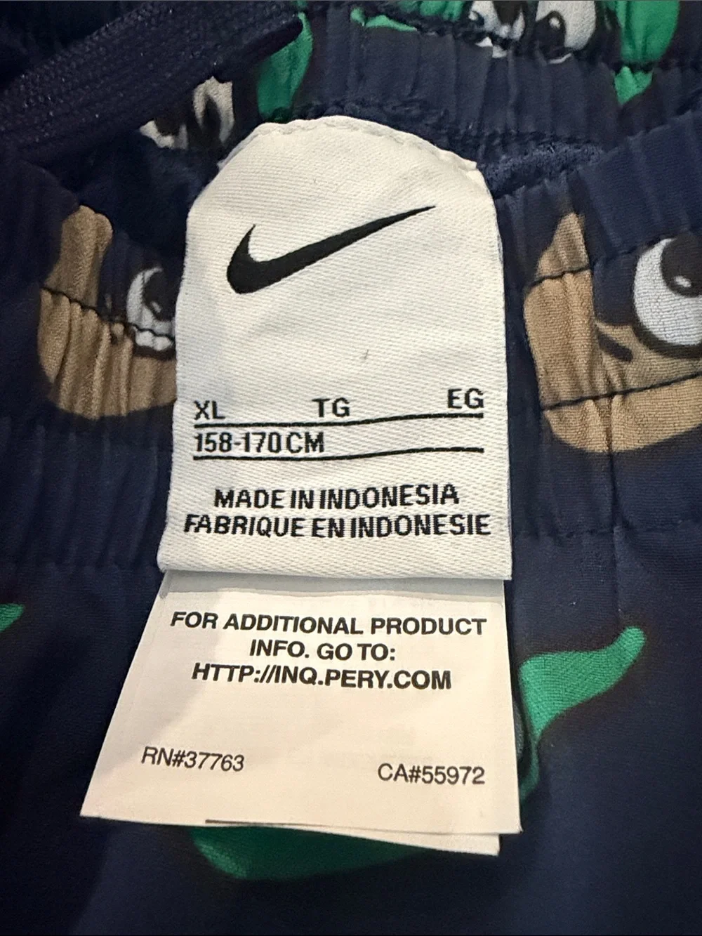 Nike Navy Swim Shorts with Green & Gold Eye Swooshes